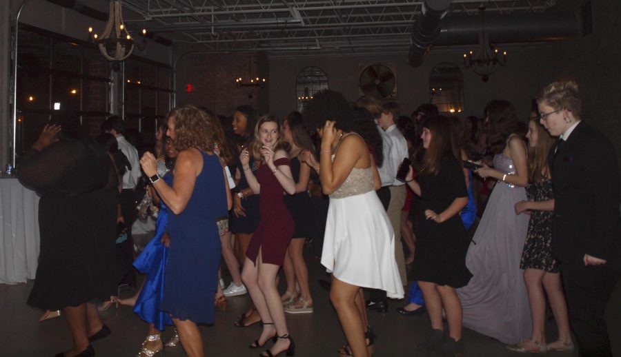 Students line dancing at the annual charity gala