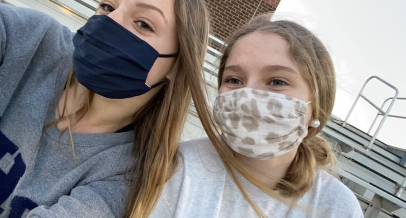 Athens Drive freshmen Blythe Holloway and Lyndsey Delmar have to learn to adapt to a new school while wearing masks and remote learning.