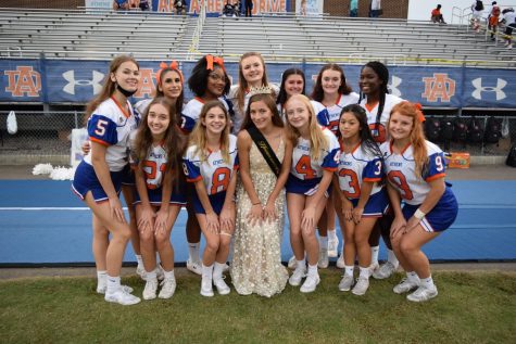 Athens Drive High School cheerleaders team celebrating their captains win Homecoming Queen, Eliza Magana.