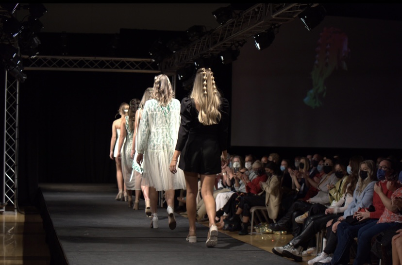 Peyton Brownlee (in black) presents her senior collection verdant on the NC state fashion show runway