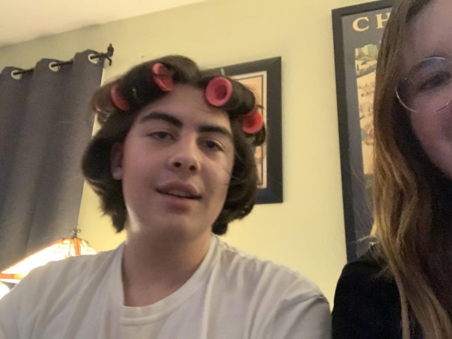 Myles Bodor (left) and Lena Flynn (right) celebrating a Friendsgiving together. Bodor allowed Flynn to put hot rollers in his hair and claimed he was burnt by them. 