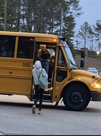 Students board the bus in the morning to head to school. Bus drivers shortages have caused headaches for students and parents around the county this school year.