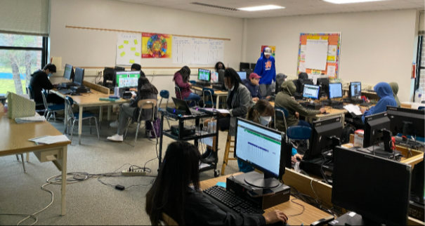 Students working hard in their Microsoft Excel Class. Students with masks and without masks because of the new policy of masks being optional since March 7th. 
