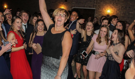 Ms.Worrell dances with students and celebrates all of HOSAS hard work on the  sweetheart charity gala.