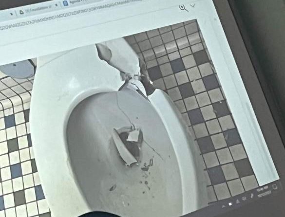 This photo of the toilet that was shot circulated Cary High School via Snapchat. This is only one example of the rise in gun violence.
