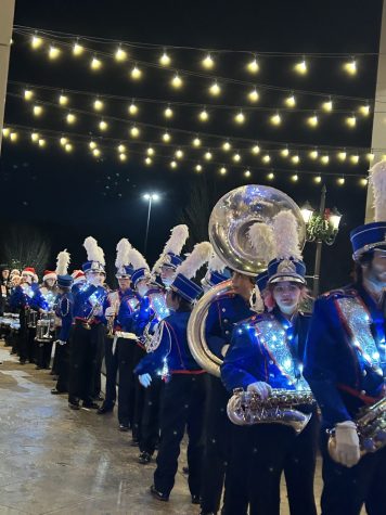 Lining up before the march was the Athens Drive marching band. Ready to play christmas music at the Waverly place tree lighting. 