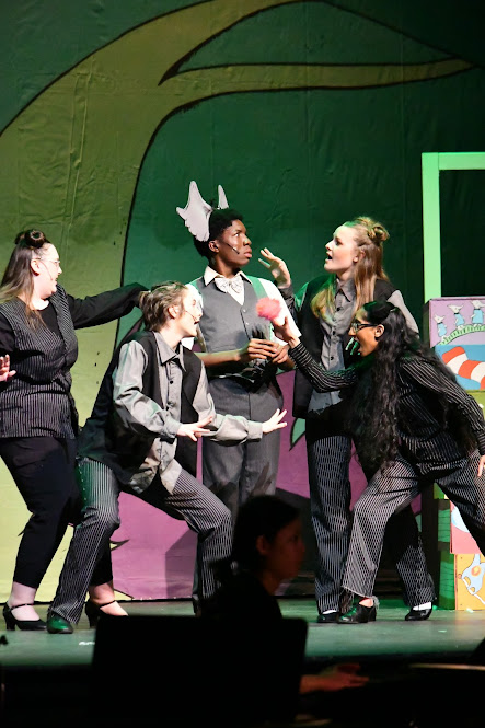 (Left to right) Sydney Sammons, Jamie Holmes, Timere Leak (Horton), Paige Parrish, and Amala Kapilavai as the monkeys surround Horton and terrorize him on stage.