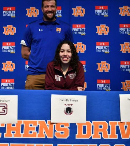 Camila Pierce signing with MIT [Massachusetts Institute of Technology] with her Coach, Shane Barry.