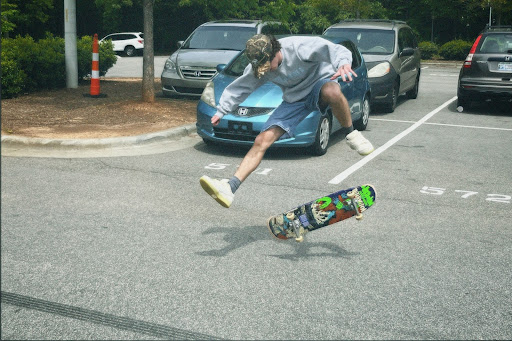 Sophomore Eddie Testa popping a kickflip. 