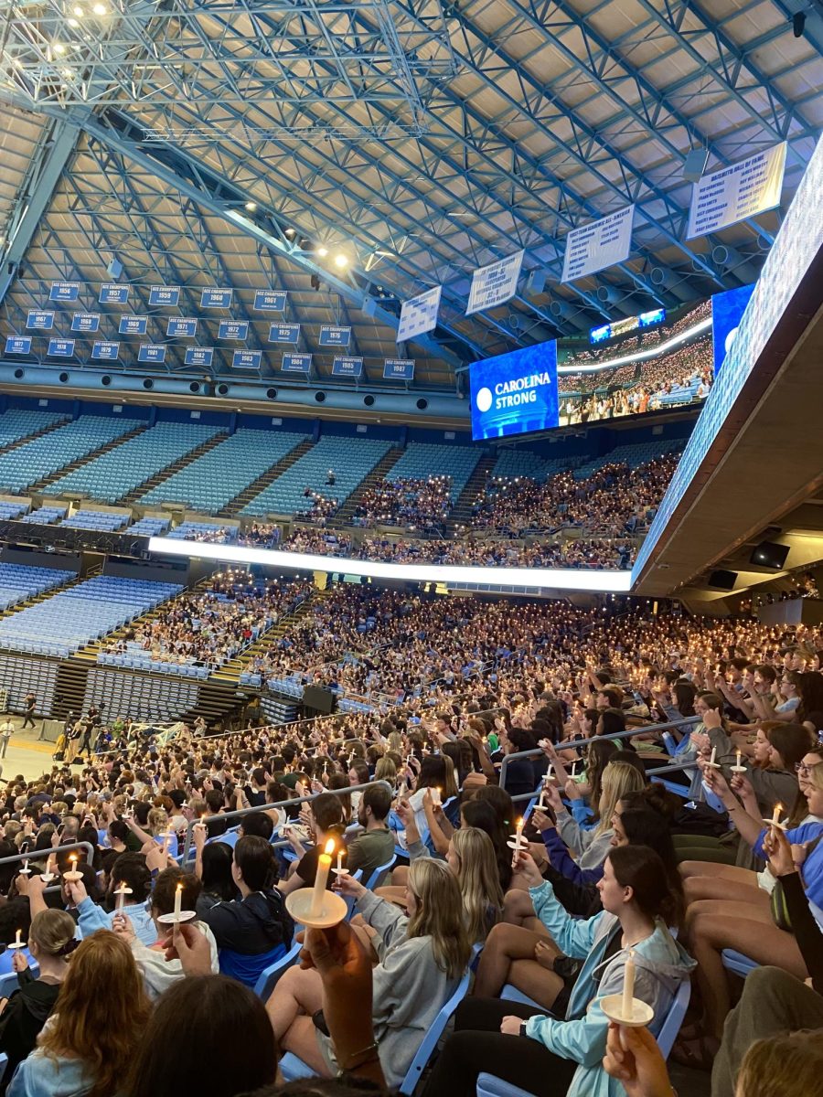 UNC+Chapel+Hill+candlelight+vigil+in+the+Smith+Center+to+honor+Dr.+Yan+and+start+the+journey+of+healing+together.