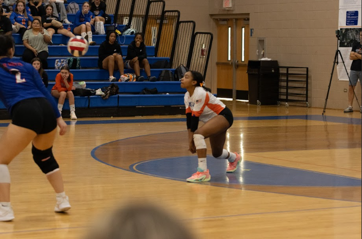 Amira Barnes, Senior gets ready to play defense against the opposing team.