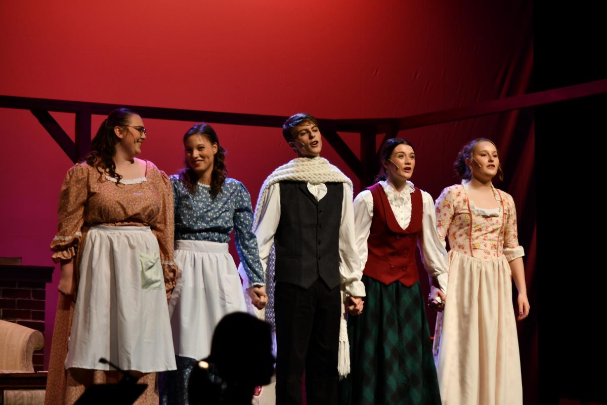 Performers Sydney Sammons, Clare Roth, Maxwell Haugh, Emma Dilley, and Paige Parrish join together in song. (Photos courtesy of Lia Web)