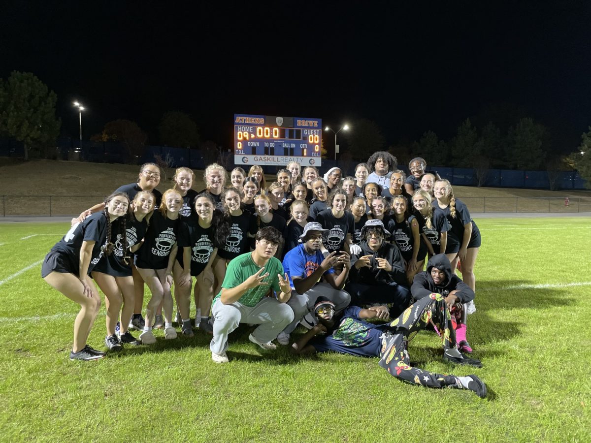 The Senior Powderpuff team celebrates after being victorious for the 26th year in a row. 