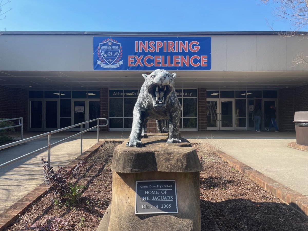 The Athens Jag in front of the public library at Athens symbolizes the loving community it has created. Everyday, Athens students walk past the Jag and get ready for another great day of learning.