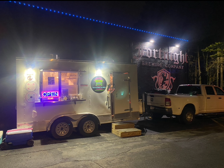 The family business food truck of Damian Rodriguez, parked and serving at Fortnight, a local brewery, in Cary, N.C.
