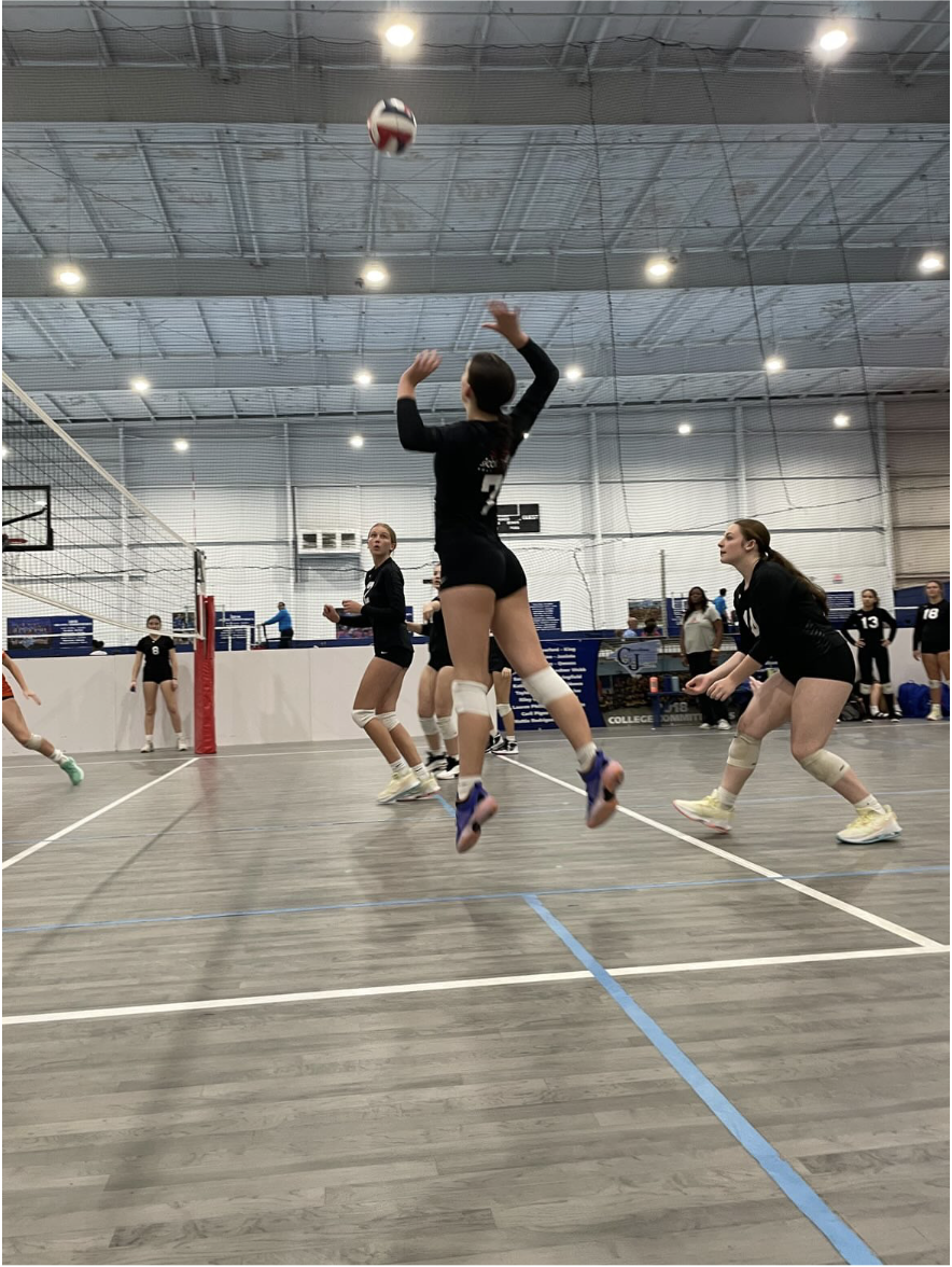 Izzy Marin goes for a hit in a tournament game. Martin Plays Outside hitter, meaning she is to the left of the middle and is considered one of the ‘main hitters’. 