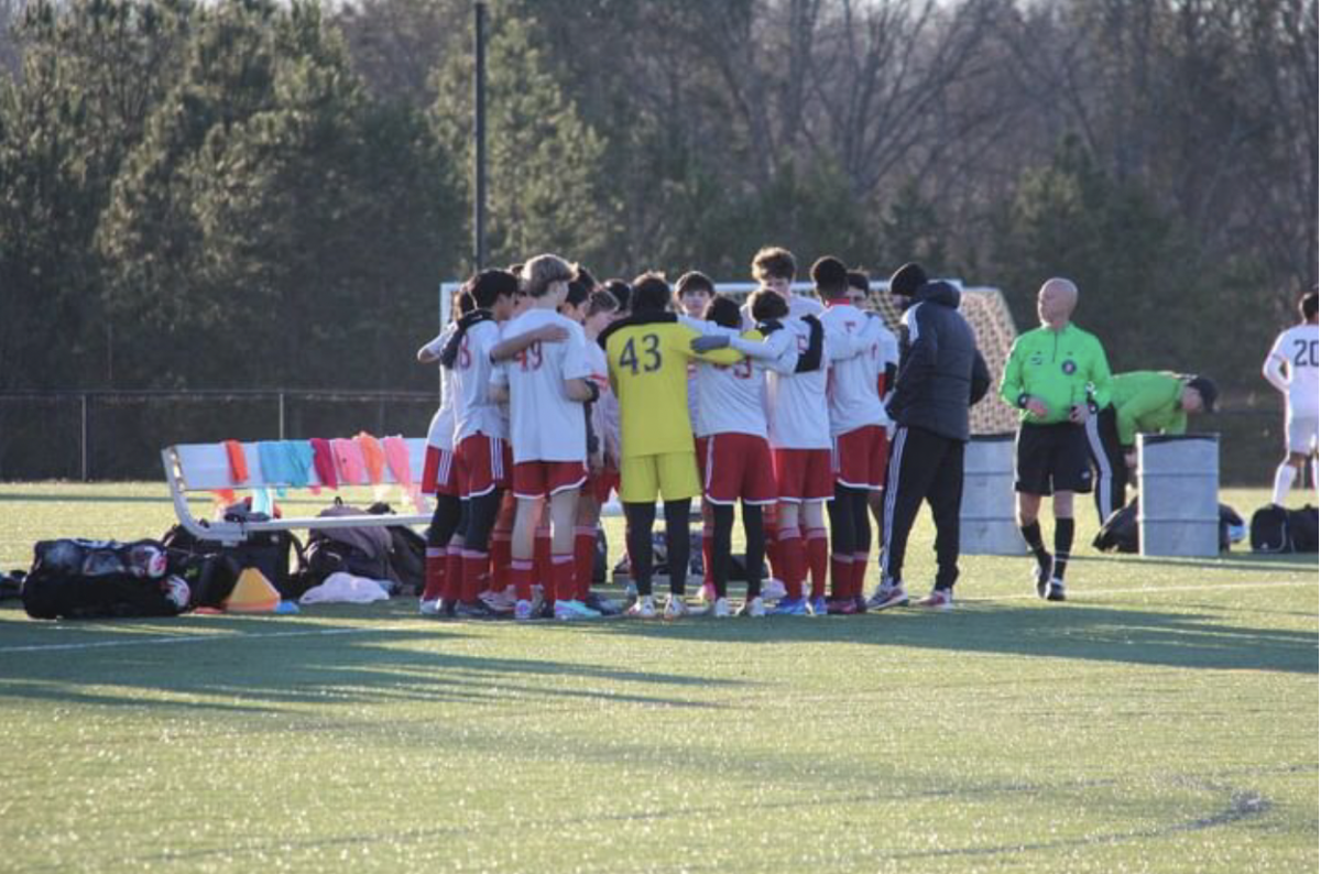The NCFC soccer team comes in for a huddle in the middle of the game. Bridges (center), as a goalie is a major part of the team and extremely important in team discussion. Photos provided by Ryan Bridges 