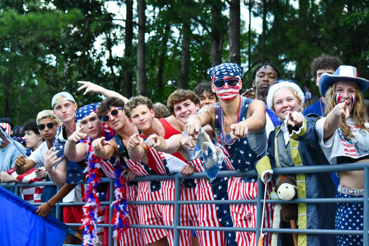 Blue Crew members at the Red White and Blue themed game against Cary. Spirits high in hopes for a big win.