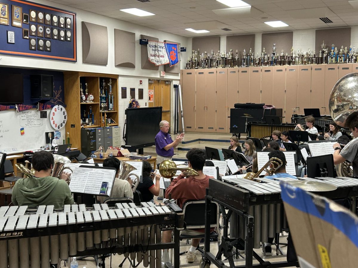 Jerome Markoch photographed conducting during his 3rd period band class.