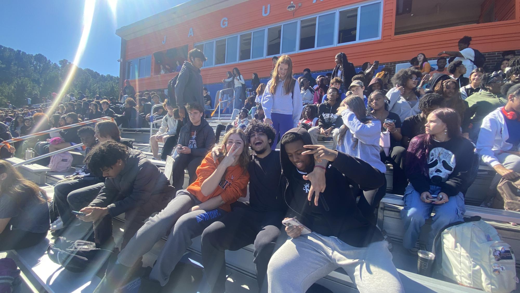 Students pictured at Athens Drive enjoying the annual pep rally. The pep rally was an exciting opportunity for students to build momentum for the homecoming game later that night.