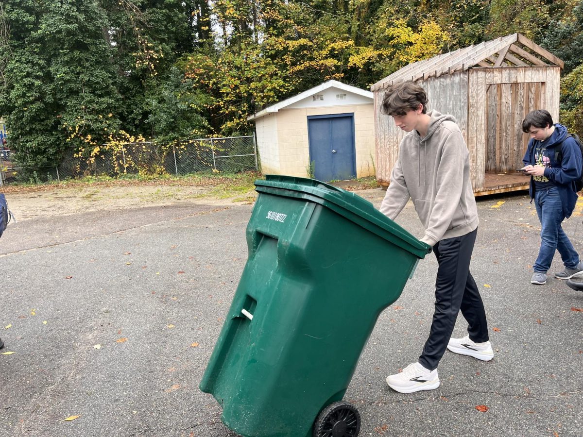 To finish up the day, They take the trash behind the school and dump it in another recycling bin The Recycling Club is helping to make a cleaner environment not just for the school, but everybody. 