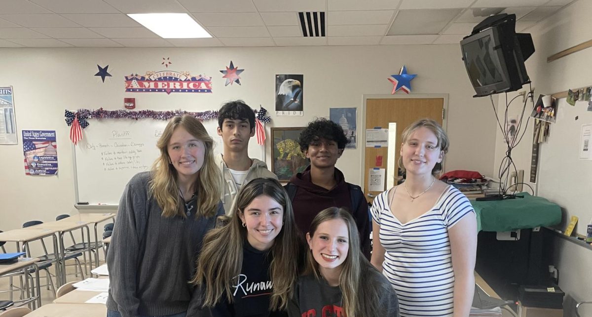 The Mock Trial team poses for a photo together 