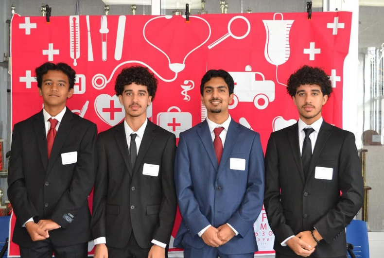 Aimane Abdane, Ahmed Abdane, Adnan Sheikh, and Adnan Pathan posing for pictures at the HOSA Bowl. They participated in the HOSA Bowl and won 3rd place.
