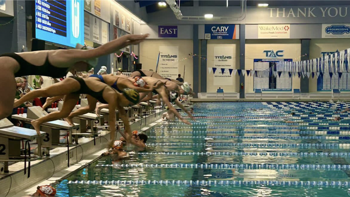 Swimmers dive in fast to start off their event. 