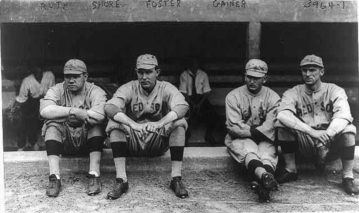 Babe Ruth won a monumental 7 world series, tied for third of all time. [Babe Ruth, Ernie Shore, Rube Foster, Del Gainer, Boston Red Sox, American League] by [Library of Congress] is licensed under [Public Domain Mark 1.0]
