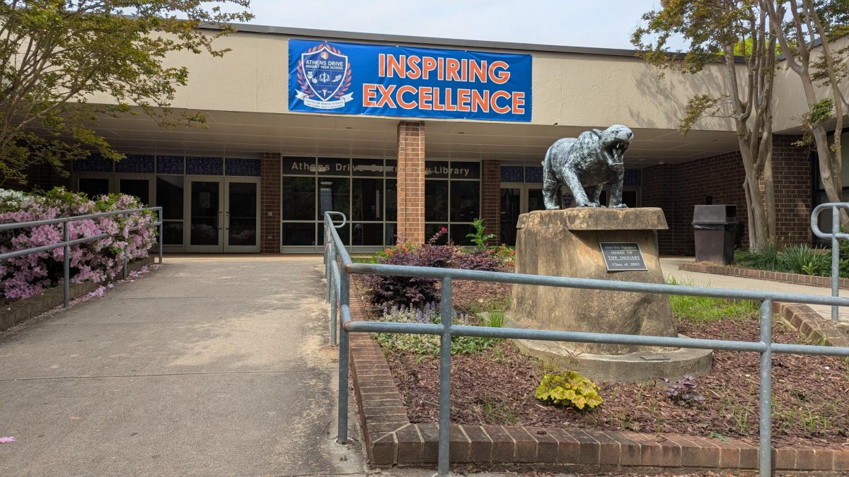 The library-side entrance to Athens Drive. A large banner with the ADMHS logo contains the words "Inspiring Excellence"