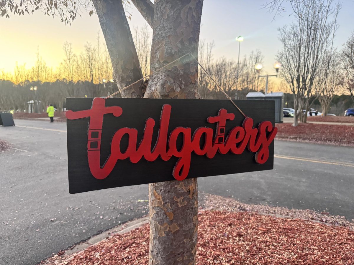 A sign with the inscription of ‘tailgaters’ is seen hanging on a tree outside Lenovo Center. The sign is owned by Annie Goldman, who brings it to all of her pregame tailgates with her friends.
