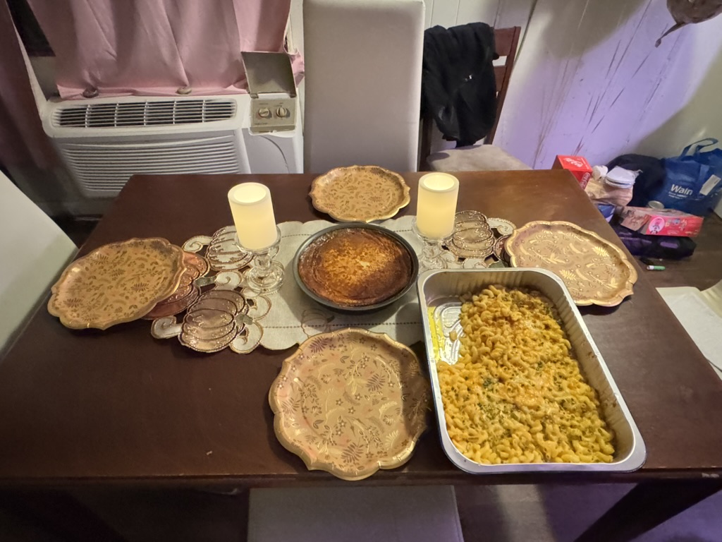 Getting set up for the Thanksgiving dinner, where they started to lay out the food. As a non-traditional Thanksgiving dinner, where different foods are being prepared. 