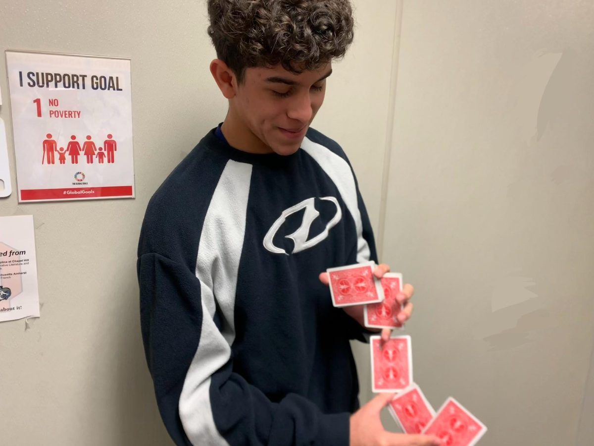 Jesus Escalona Gutierrez performs one of his cardistry tricks. Gutierrez started his card wielding hobby in October and has performed ever since. 