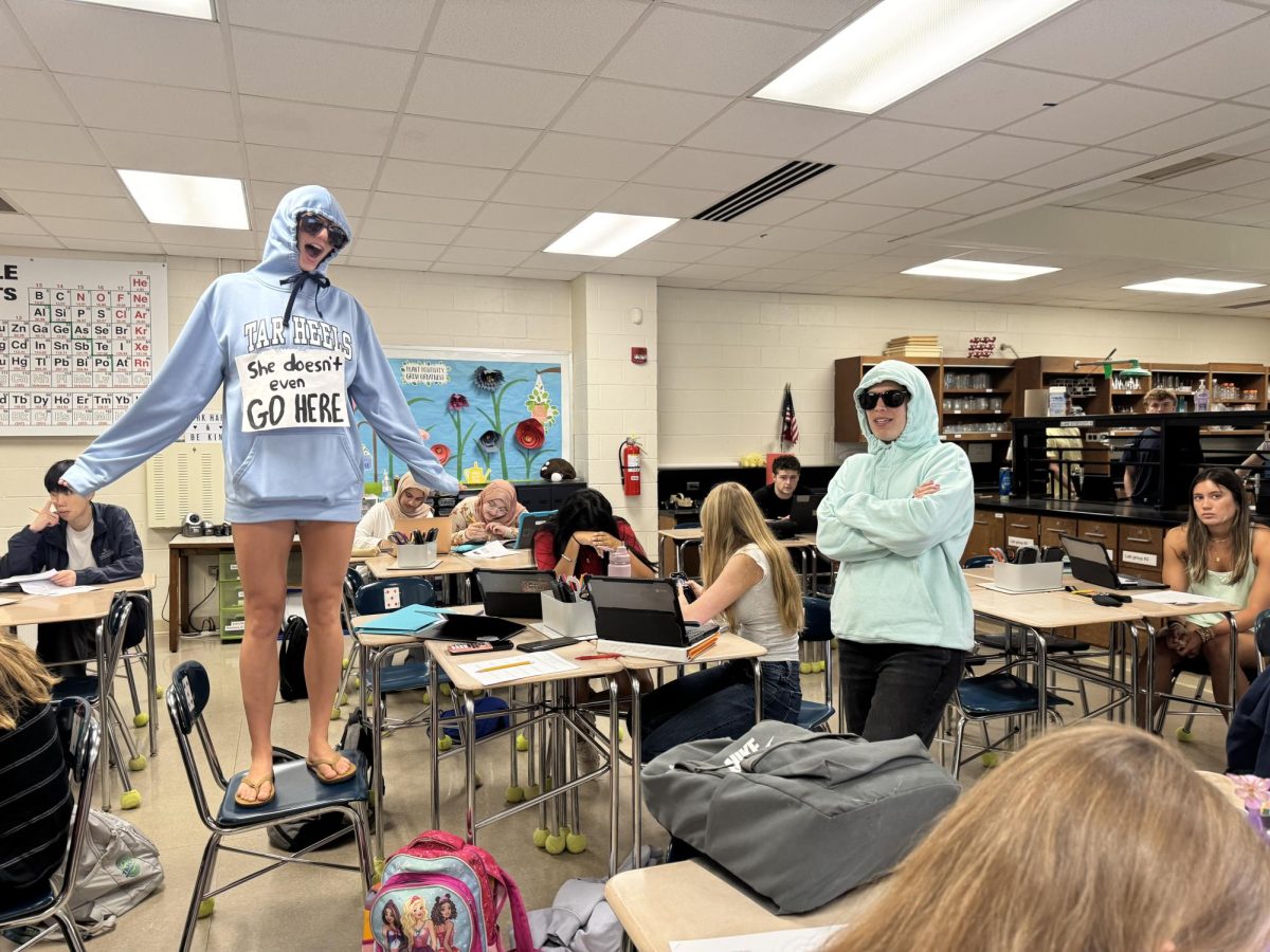 Libby O'Leary (left) and Lauren Latta are shown dressed up for Meme Monday. They were dressed up as Damian from Mean Girls, saying "She doesn't even go here!"