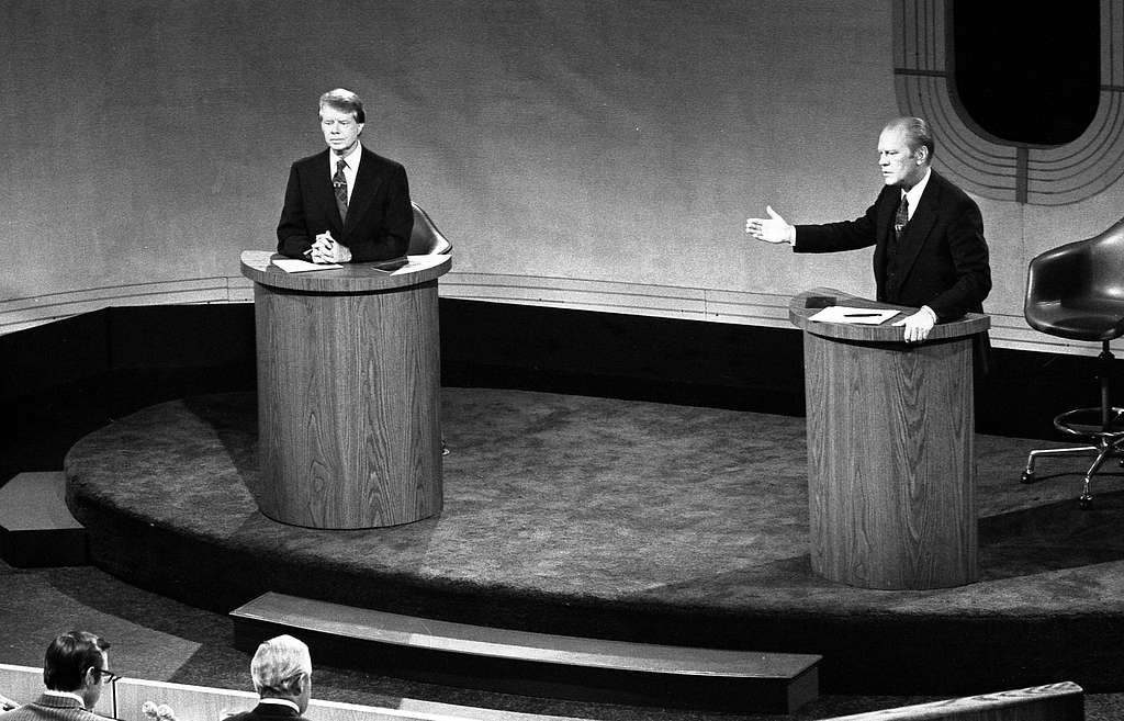 Jimmy Carter and Gerald Ford during a political debate, Sep 23, 1976. Debates are where politicians have the best opportunity to sway public opinion on them. (Picture licensed by Public Domain Mark 1.0 Universal.)