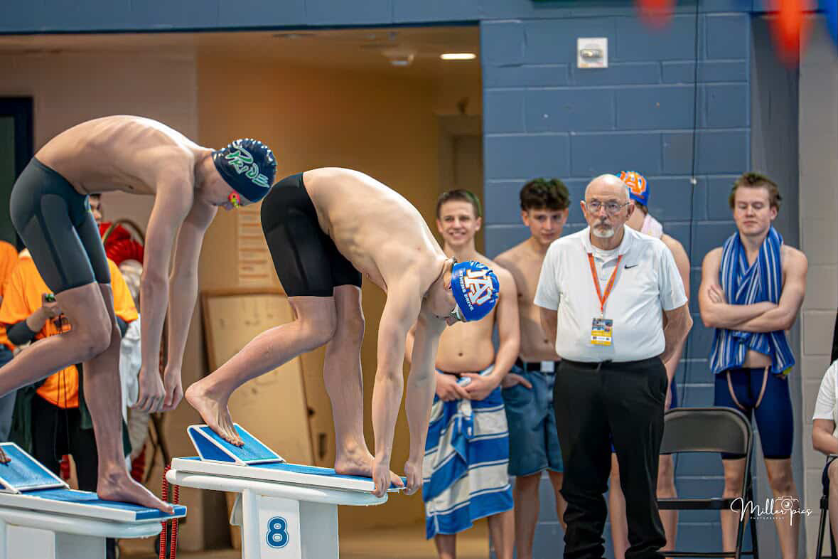 Carter Wooten is seen ready to dive into the water before his event. All the swimmers competing get set on diving blocks before a buzzer sounds to start the race. (Photos courtesy of Travis Seese)
