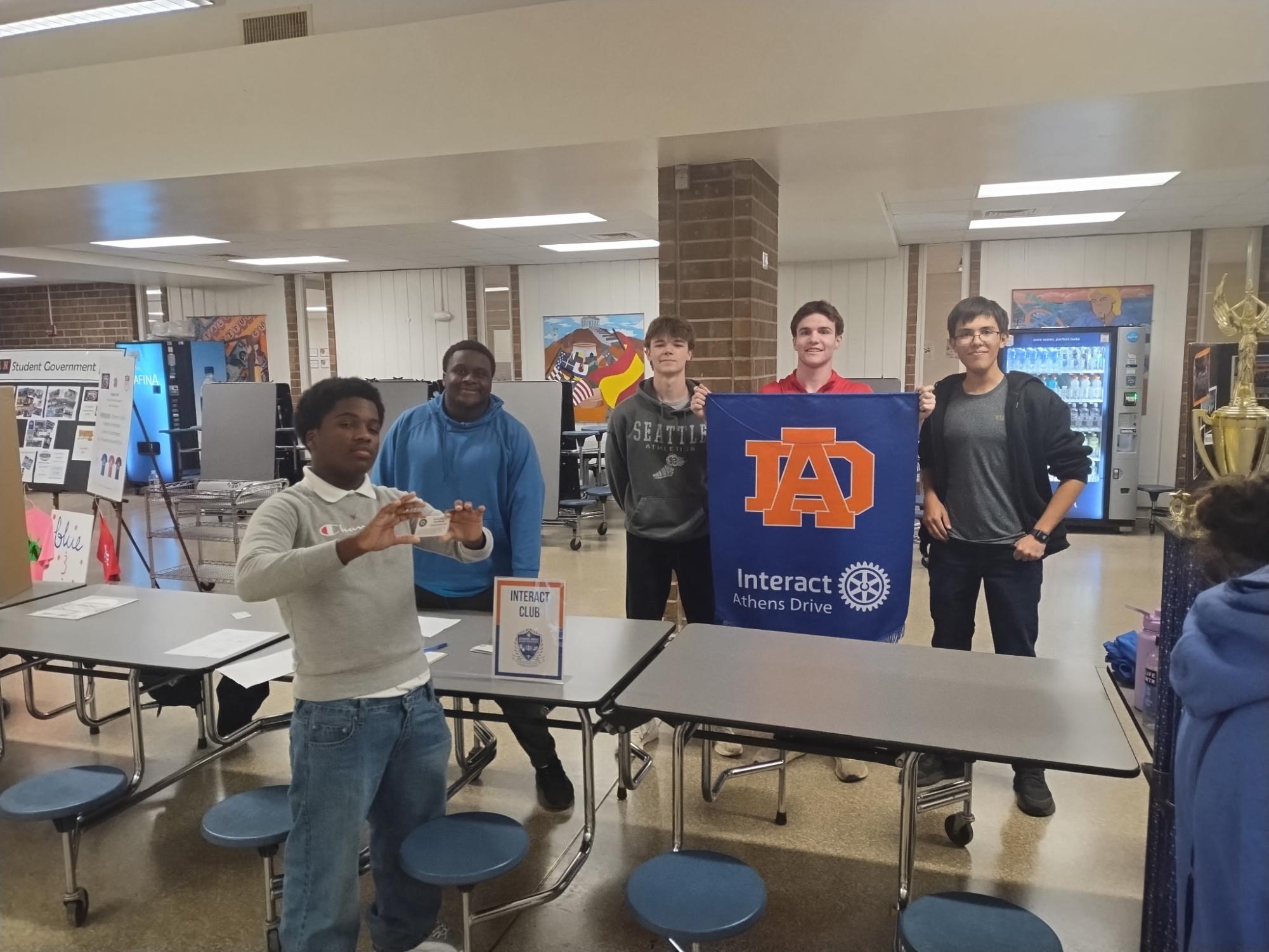 InterACT club recruiting members to grow their community.