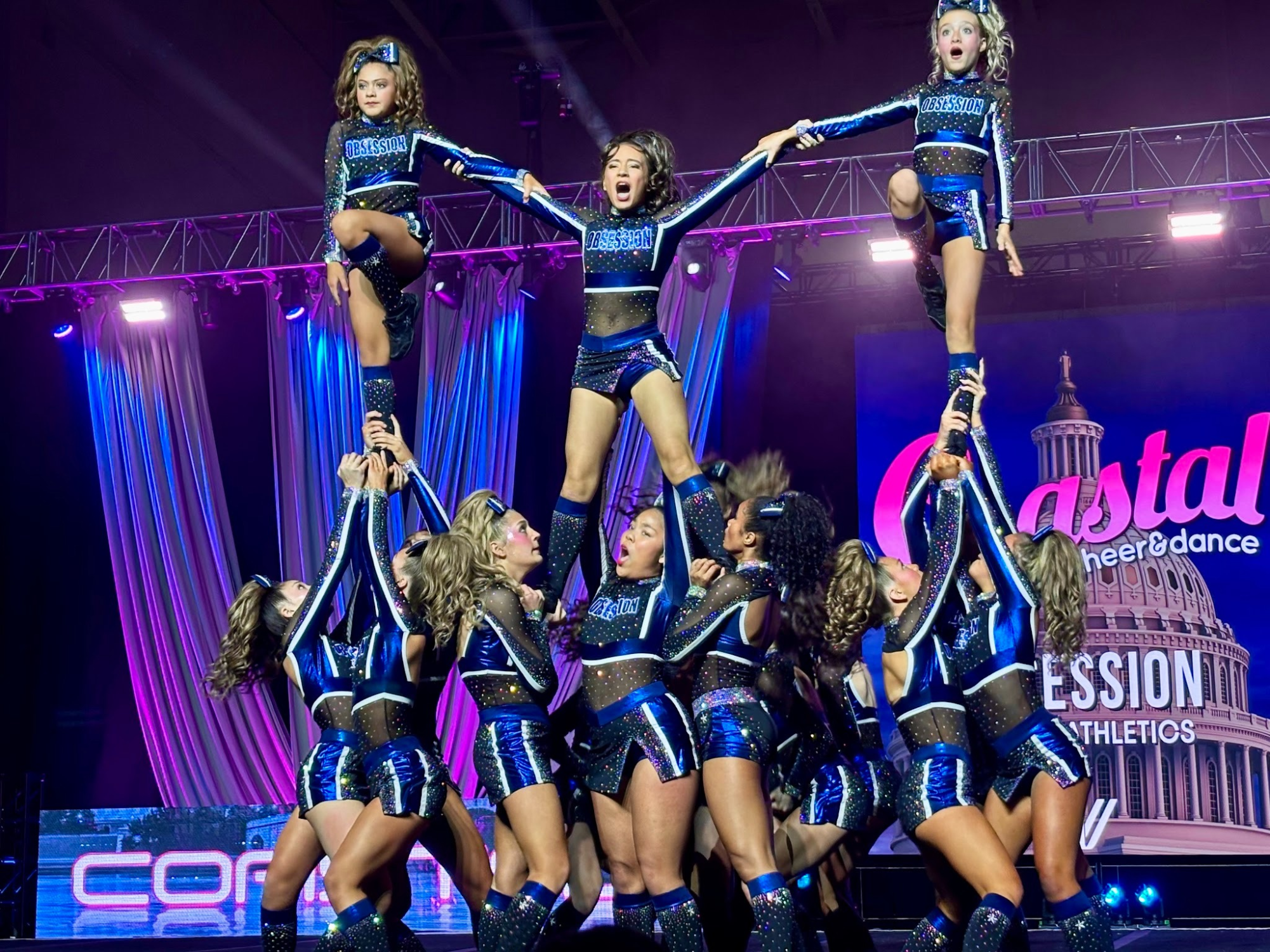 Medium Junior Level 4 team Obsession shows off their pyramid consisting of extended one leg stunts. Obsession performed in Washington DC at the Coastal at the Capital competition.
